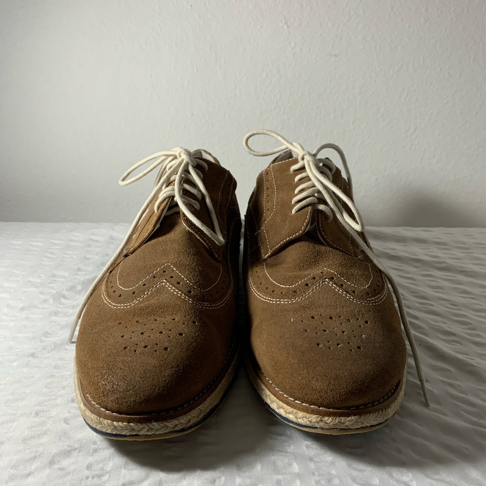 Pre-owned size 12 shoes.